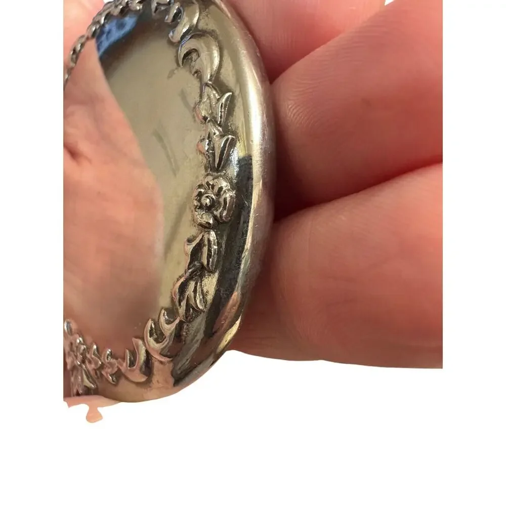 Sterling Antique Handheld Beveled Floral Design